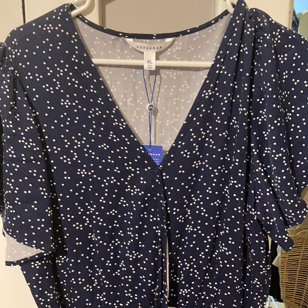 NWT navy blue with white polka dots romper